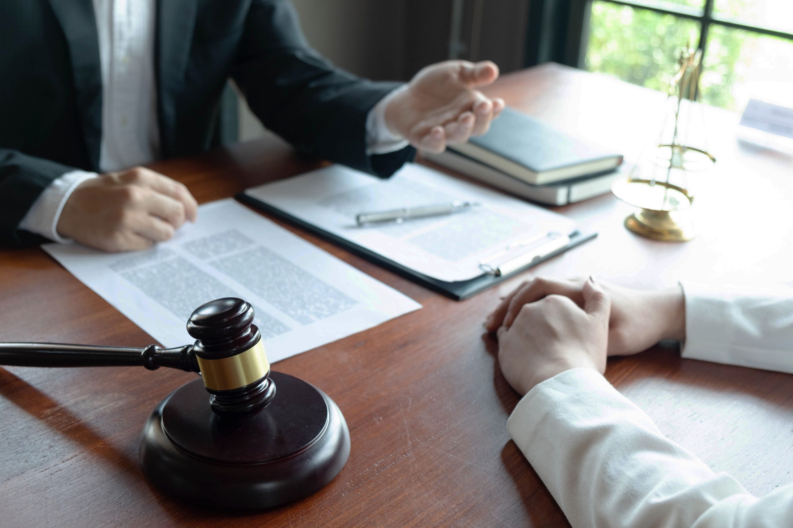 crime_insurance Lawyer and client discussing business theft insurance claim