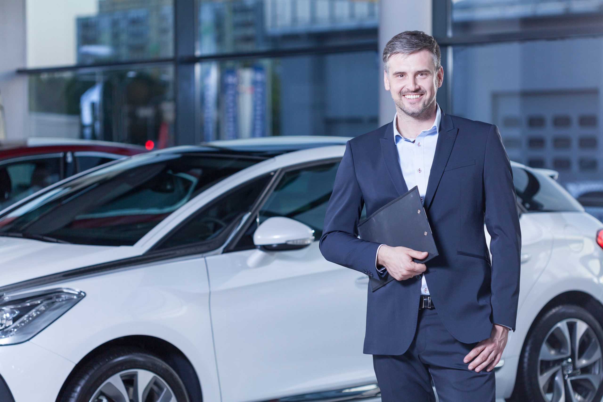 automobile_insurance Man working for Seattle, Washington airport transportation service