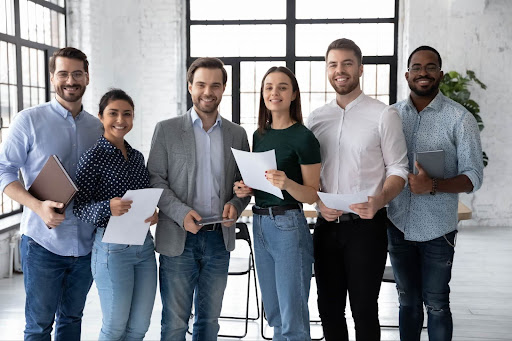 team Group of restaurant employees read for a health insurance meeting